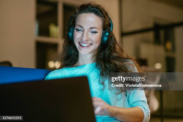woman on video call in the office. - office space movie stock pictures, royalty-free photos & images