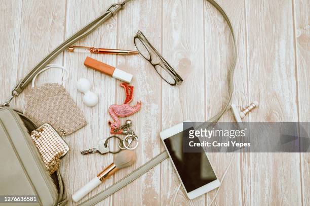 content of woman bag in the pandemic times .overhead shot - ハンドバッグ ストックフォトと画像