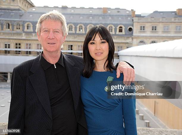 Regis Varnier and Linh-Dan Pham pose after she receives the medal "Chevalier des Arts et lettre" at Ministere de la Culture on April 5, 2011 in...