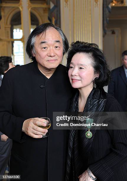 Yoon Jung-Hee pose with her Husband Kun-woo Paik after she receives the medal "Chevalier des Arts et lettres" at Ministere de la Culture on April 5,...