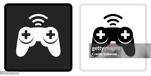 wireless game controller icon on black button with white rollover - white game controller stock illustrations