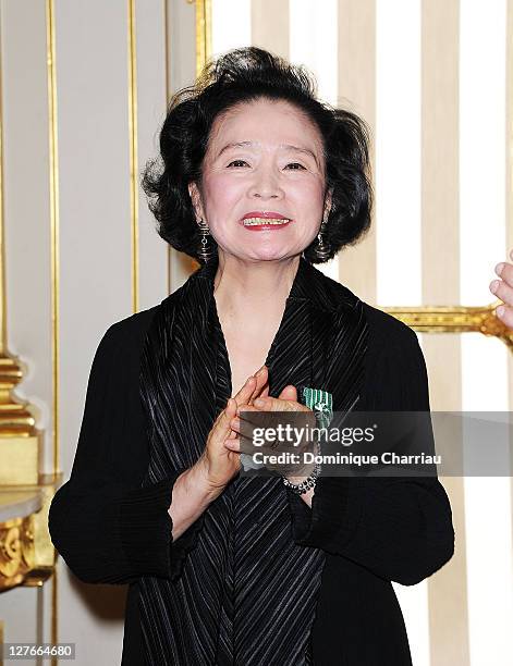 Yoon Jung-Hee poses after she receives the medal "Chevalier des Arts et lettres" at Ministere de la Culture on April 5, 2011 in Paris, France.