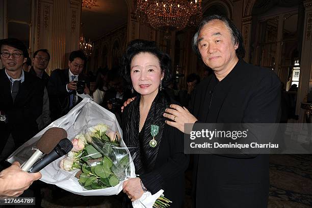 Yoon Jung-Hee pose with her Husband Kun-woo Paik after she receives the medal "Chevalier des Arts et lettres" at Ministere de la Culture on April 5,...