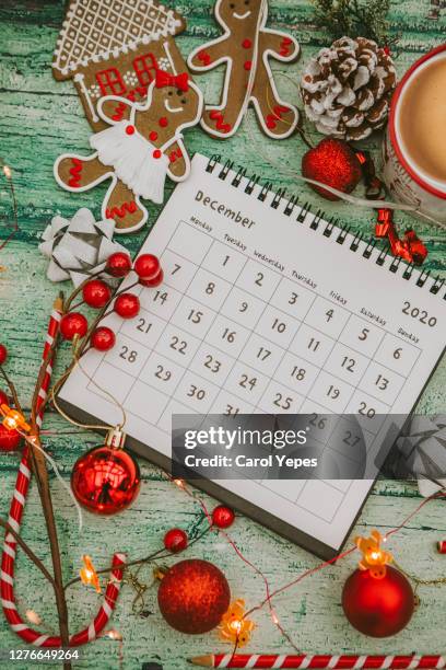 flat lay december calendar in rustic wood background - season schedule announcement stock pictures, royalty-free photos & images