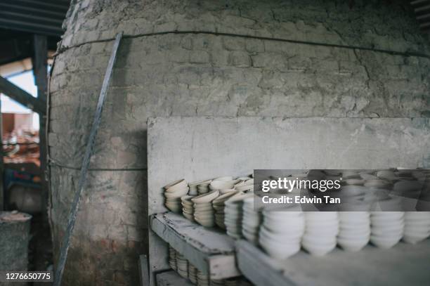 termite pottery kiln with smoke - kiln stock pictures, royalty-free photos & images