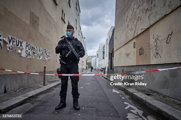 Armed police secure the area of around the former Charlie Hebdo headquarters, and scene of a previous terrorist attack in 2015, after two people were...