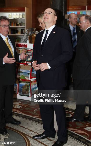 Prince Albert and Charlene Wittstock visit the National Museum of Ireland on the first day of his state visit on April 4, 2011 in Dublin, Ireland.