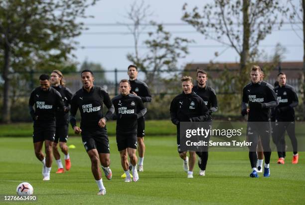 Players seen L-R Callum Wilson, Jeff Hendrick, Isaac Hayden, Ryan Fraser, Federico Fernández, Matt Ritchie, Dan Barlaser, Emil Krafth and Javier...