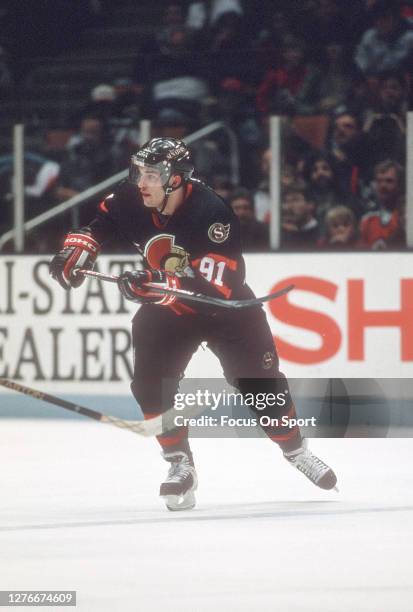 Alexandre Daigle of the Ottawa Senators skates against the New Jersey Devils during an NHL Hockey game circa 1994 at the Brendan Byrne Arena in East...