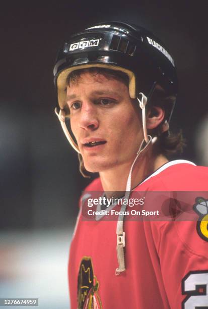 Jeremy Roenick of the Chicago Blackhawks looks on against the New Jersey Devils during an NHL Hockey game circa 1991 at the Brendan Byrne Arena in...