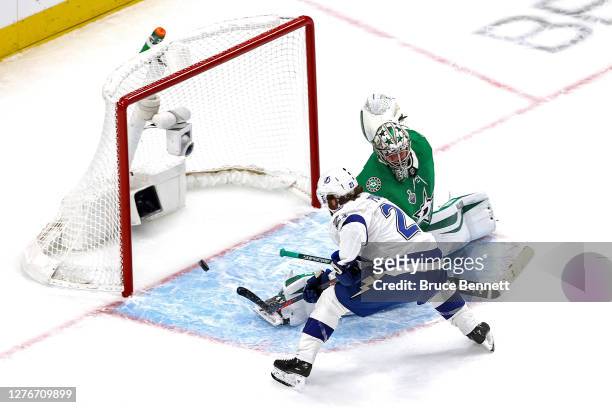 Brayden Point of the Tampa Bay Lightning scores a goal past Anton Khudobin of the Dallas Stars during the first period in Game Four of the 2020 NHL...