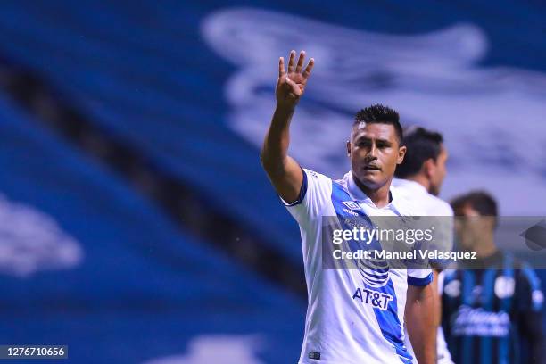 Osvaldo Martínez of Puebla celebrates the first scored goal of Puebla during the 12th round match between Puebla v Queretaro as part of the Torneo...