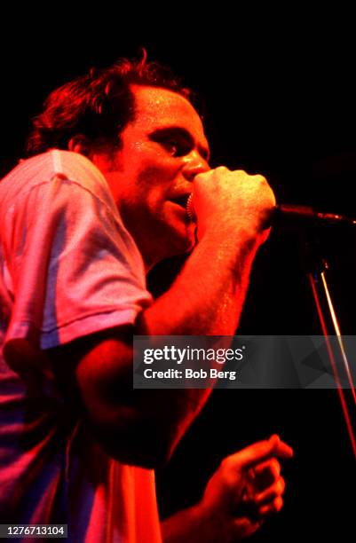 Lead singer Gordon Downie of the Canadian rock group The Tragically Hip sings on stage during a concert circa February, 1992 in New York, New York.