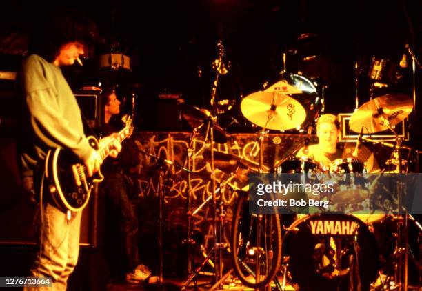 Bassist Paul Langlois and drummer Johnny Fay of the Canadian rock group The Tragically Hip play on stage during a concert circa February, 1992 in New...