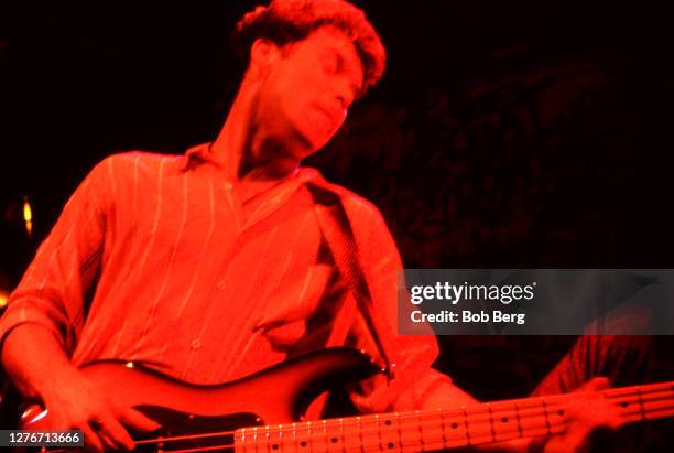 Guitarist Gord Sinclair of the Canadian rock group The Tragically Hip plays his guitar on stage during a concert circa February, 1992 in New York,...