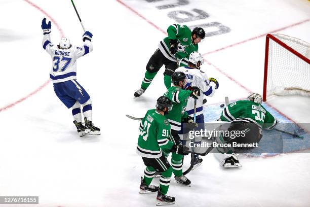 Yanni Gourde of the Tampa Bay Lightning scores a goal past Anton Khudobin of the Dallas Stars during the second period in Game Four of the 2020 NHL...