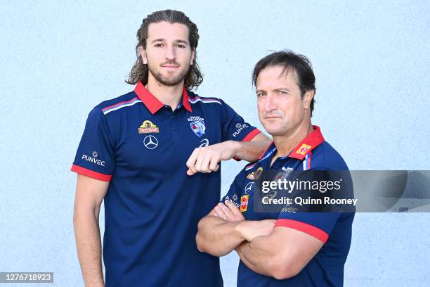 Marcus Bontempelli and Bulldogs head coach Luke Beveridge pose during a Western Bulldogs AFL training session at RACV Royal Pines Resort on September...