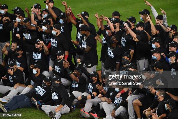 The Miami Marlins celebrate during the tenth inning against the New York Yankees at Yankee Stadium on September 25, 2020 in the Bronx borough of New...