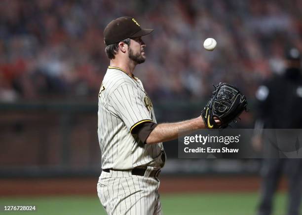 Drew Pomeranz of the San Diego Padres reacts after he gave up a home run to Wilmer Flores of the San Francisco Giants in the sixth inning of game two...