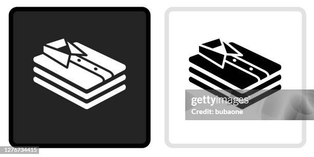 folded clothes icon on black button with white rollover - folded clothes vector stock illustrations