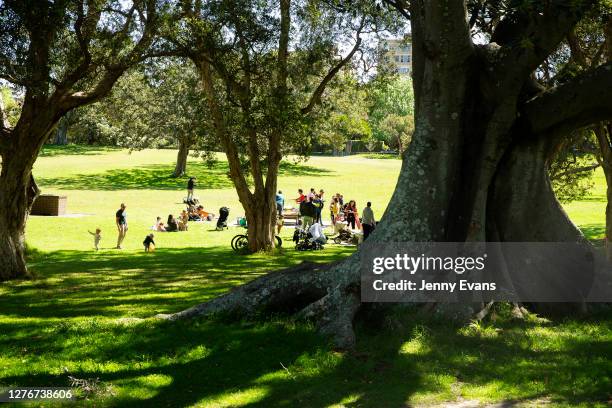 People are seen during a picnic in Centennial Park on September 26, 2020 in Sydney, Australia. Coronavirus restrictions continue to relax for...