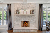 Gorgeous stone fireplace with wood mantel