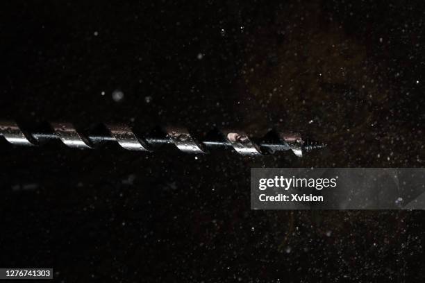 wooden drill bit with dust studio shot - sharp turn stock pictures, royalty-free photos & images