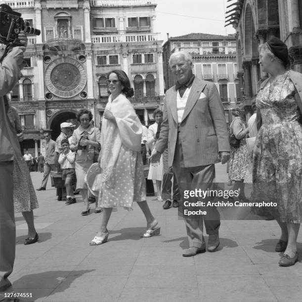 British actor Charlie Chaplin with Oona O'Neill in St. Mark Square, Venice, 1959.