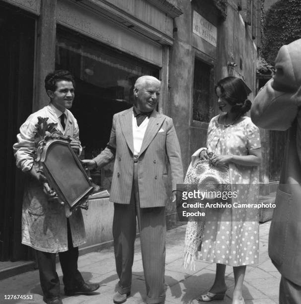 British actor Charlie Chaplin with Oona O'Neill, Venice, 1959.