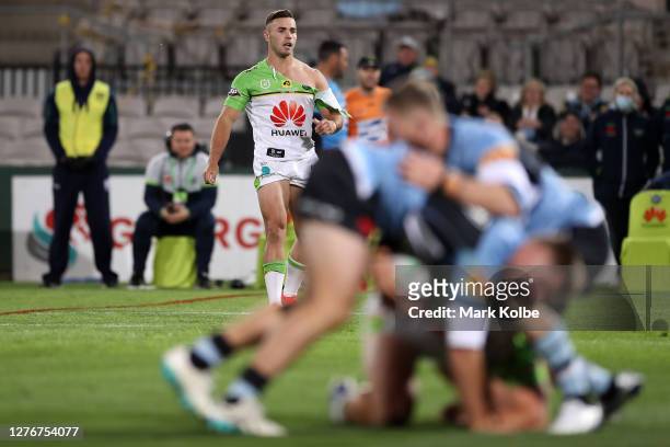 Harley Smith-Shields of the Raiders is seen with a torn jersey during the round 20 NRL match between the Cronulla Sharks and the Canberra Raiders at...