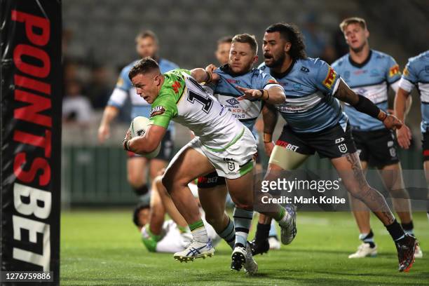 Kai O'Donnell of the Raiders scores a try during the round 20 NRL match between the Cronulla Sharks and the Canberra Raiders at Netstrata Jubilee...