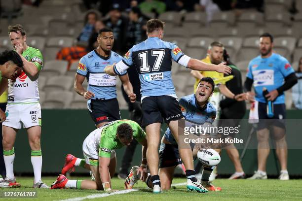 Bryson Goodwin of the Sharks scores a try during the round 20 NRL match between the Cronulla Sharks and the Canberra Raiders at Netstrata Jubilee...