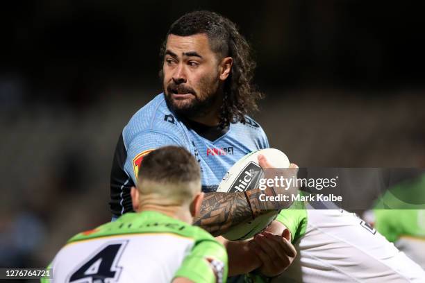 Andrew Fifita of the Sharks is tackled during the round 20 NRL match between the Cronulla Sharks and the Canberra Raiders at Netstrata Jubilee...