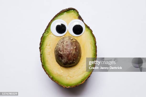 avocado head - googly eyes stock pictures, royalty-free photos & images