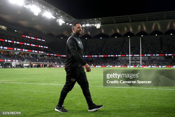 Benji Marshall of the Tigers thanks fans after playing in his last game for the Tigers following the round 20 NRL match between the Wests Tigers and...