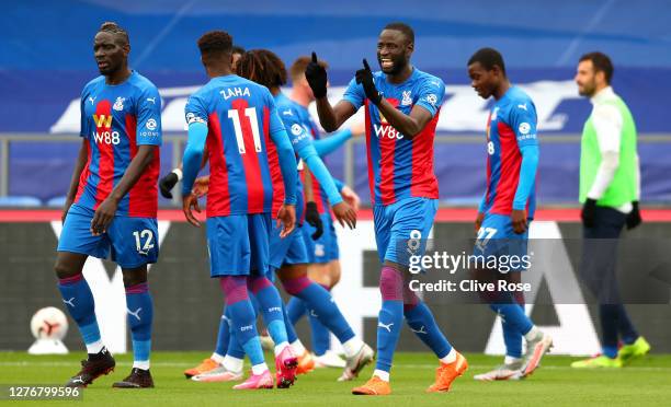 Cheikhou Kouyate of Crystal Palace celebrates after scoring his team's first goal during the Premier League match between Crystal Palace and Everton...