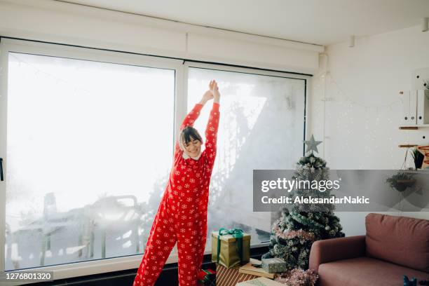 sentirse navideño - bodysuit fotografías e imágenes de stock