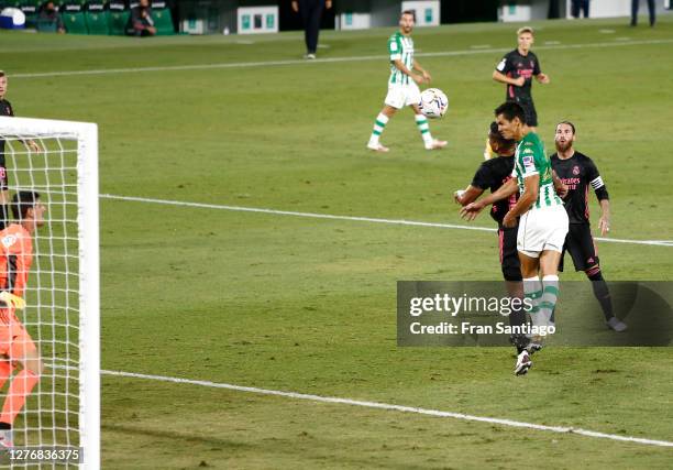 Aissa Mandi of Real Betis scores his team's first goal during the La Liga Santander match between Real Betis and Real Madrid at Estadio Benito...