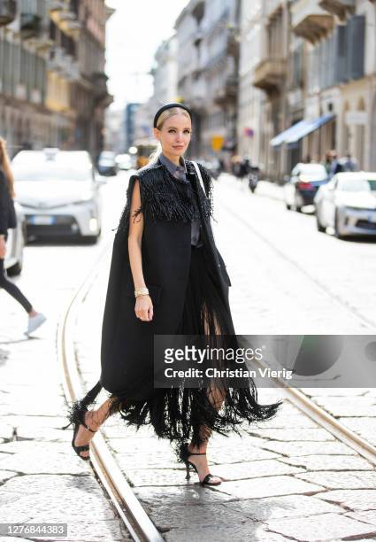 Leonie Hanne seen wearing black Prada look during the Milan Women's Fashion Week on September 26, 2020 in Milan, Italy.