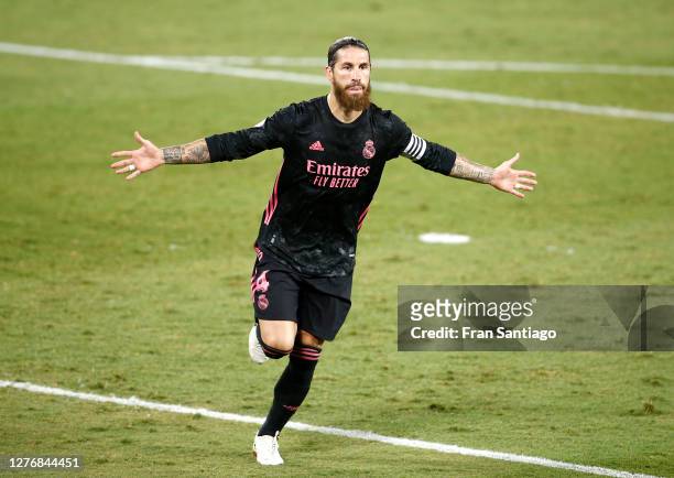 Sergio Ramos of Real Madrid celebrates after scoring his team's third goal from the penalty spot during the La Liga Santander match between Real...