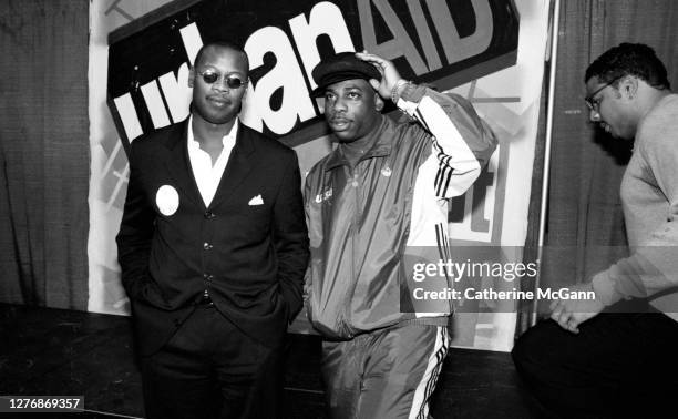 Music producer and executive Andre Harrell and Jason “Jam Master Jay” Mizell pose for a photo backstage at Madison Square Garden after Lifebeat's...