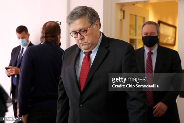 Attorney General William Barr arrives in the Rose Garden before President Donald Trump introduces 7th U.S. Circuit Court Judge Amy Coney Barrett as...