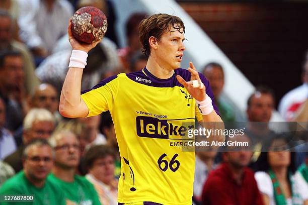 Sven-Soeren Christophersen of Berlin controles the ball during the Toyota Handball Bundesliga match between Frisch Auf Goeppingen and Fuechse Berlin...