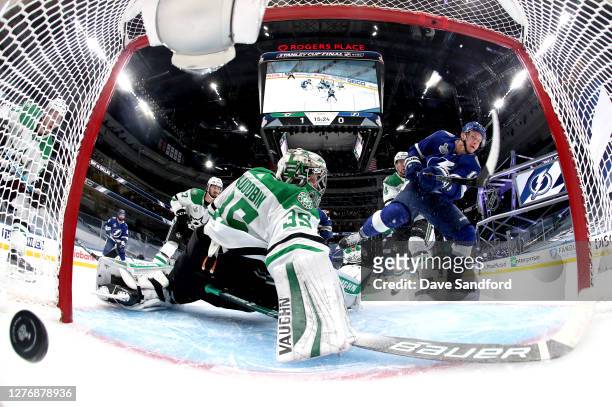 Goaltender Anton Khudobin of the Dallas Stars can't make the save on a shot for a goal by Ondrej Palat of the Tampa Bay Lightning in the second...