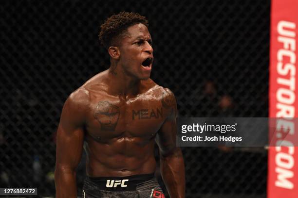 Hakeem Dawodu of Canada reacts after finishing three rounds against Zubaira Tukhugov of Russia in their featherweight bout during UFC 253 inside...