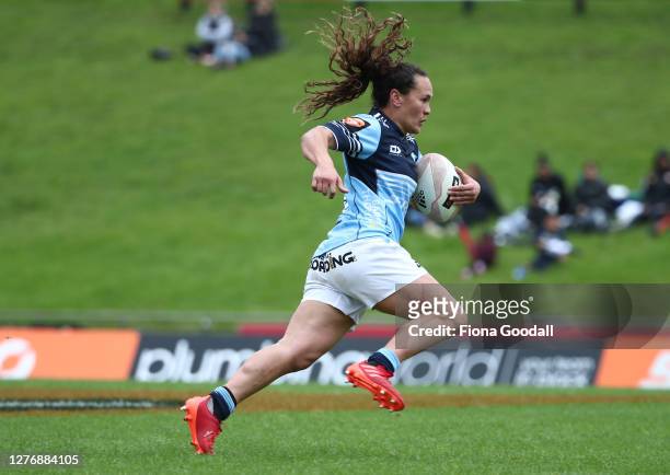 Portia Woodman of Northland makes a break during the round 4 Farah Palmer Cup match between Counties Manukau and Northland at Navigation Homes...