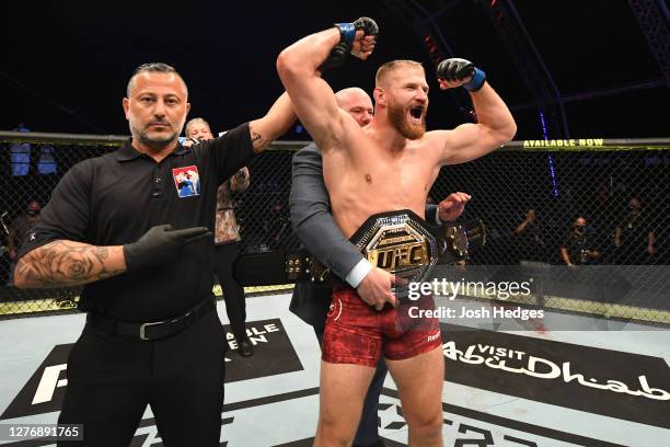 Jan Blachowicz of Poland celebrates after defeating Dominick Reyes in their light heavyweight championship bout during UFC 253 inside Flash Forum on...