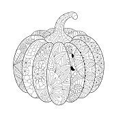 Hand-drawn pumpkin decorated with patterns, zentangle pattern.