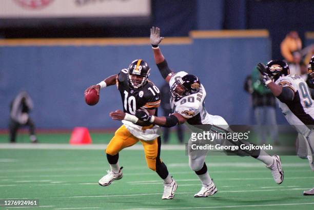 Defensive lineman Tony Brackens of the Jacksonville Jaguars sacks quarterback Kordell Stewart of the Pittsburgh Steelers during a game at Three...