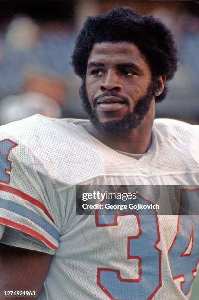 Running back Earl Campbell of the Houston Oilers looks on from the sideline during a game against the Pittsburgh Steelers at Three Rivers Stadium...